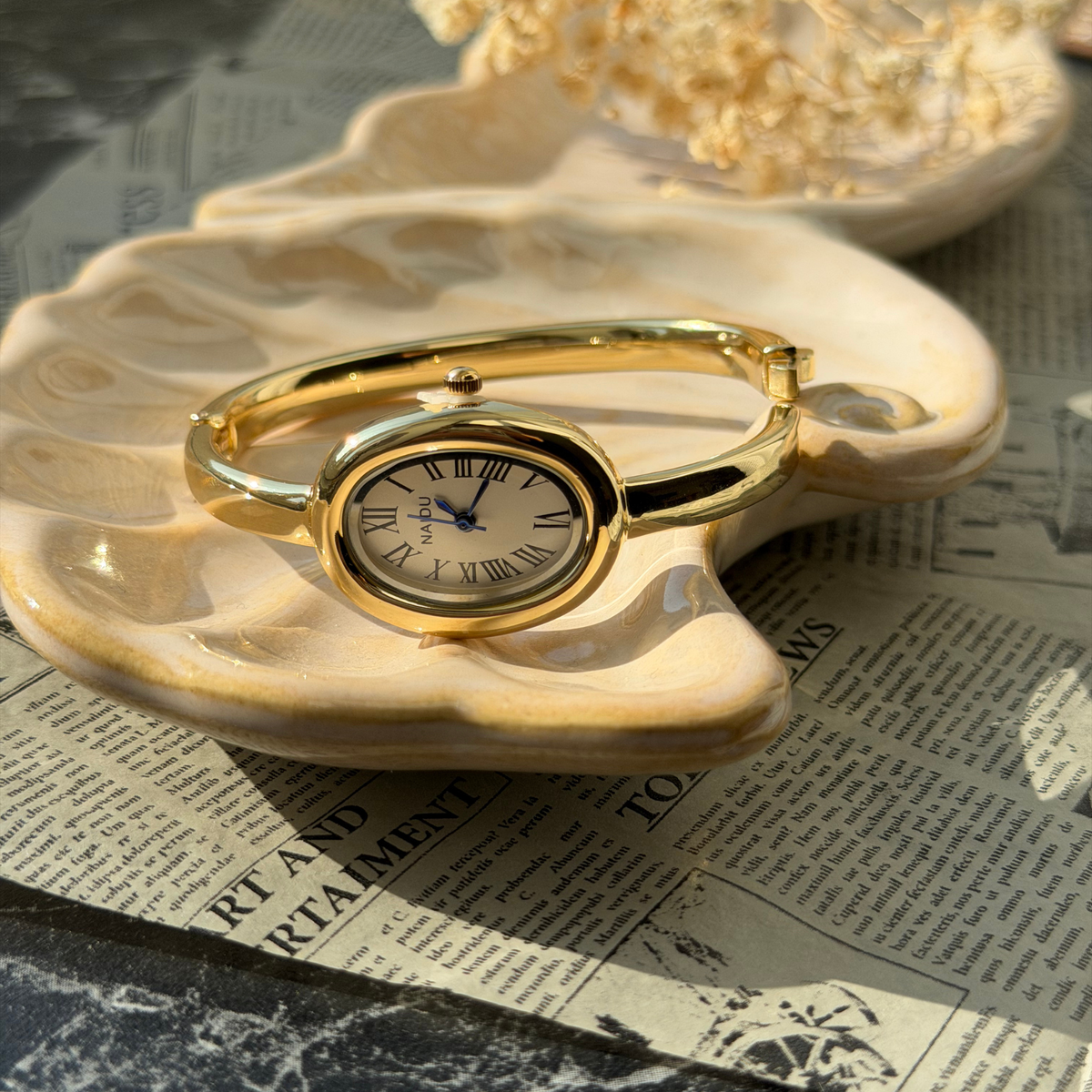 Gold Oval Watch